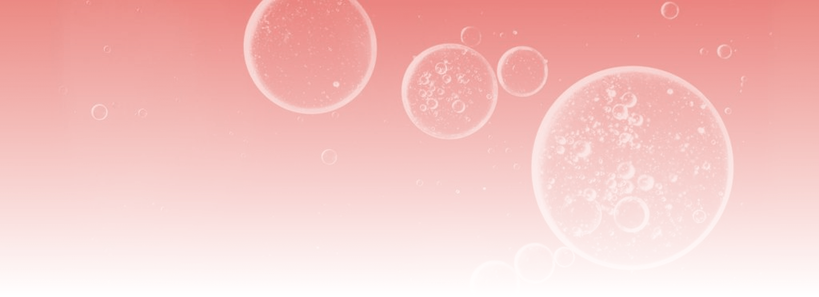 Gouttes d’huile flottant sur l’eau fond dégradé rose – site Santé Active Edition – Synergy Pharm