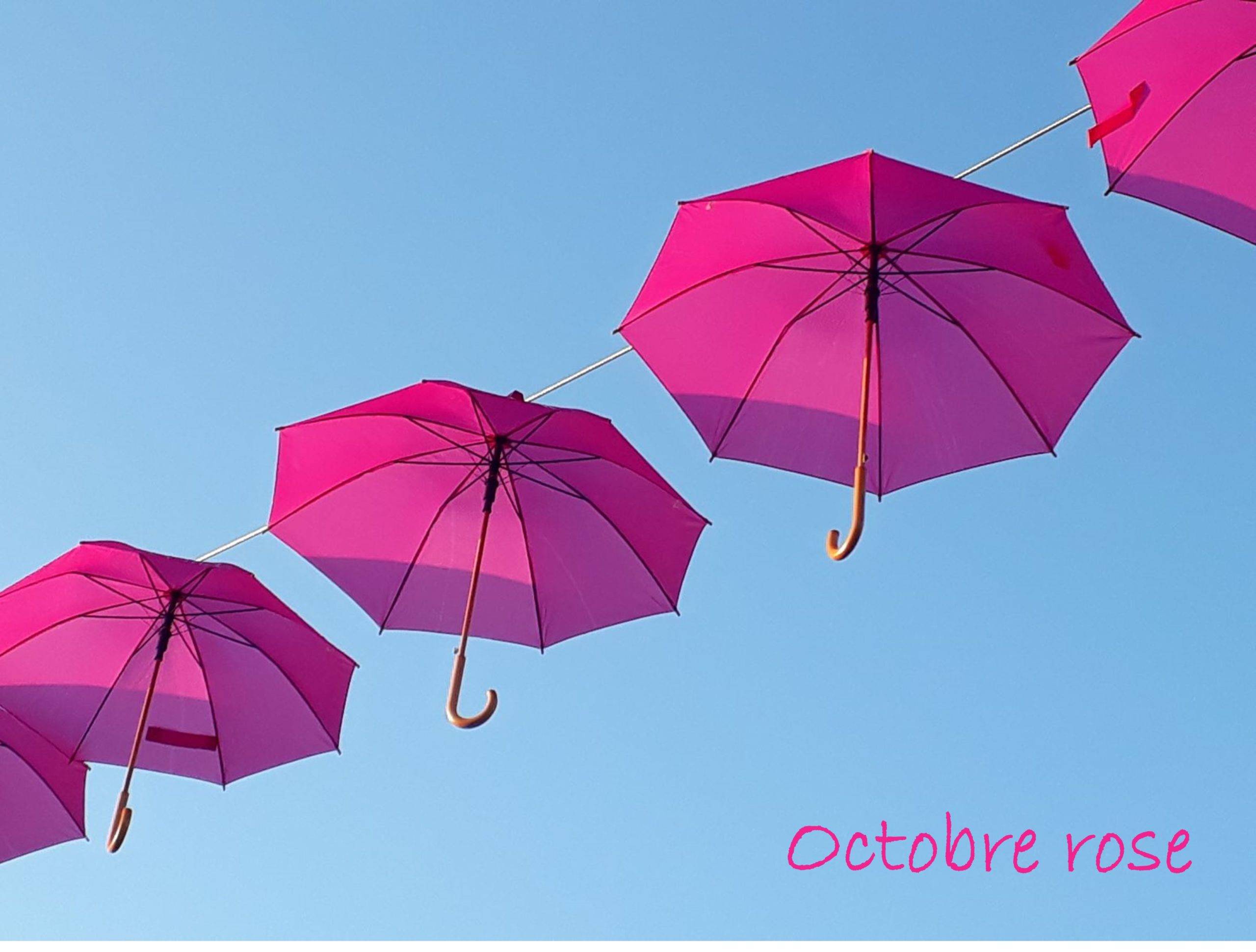 Octobre rose - parapluies roses symbolisant la lutte contre le cancer du sein